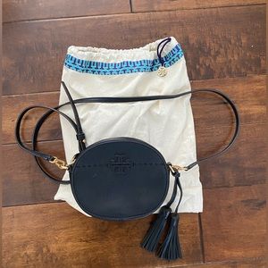 Tory Burch black pebbled leather crossbody with gold hardware.